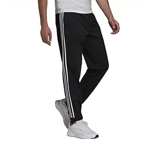 adidas mens Essentials Warm Up Tapered Stripes Track Pants, BlackWhite, Medium US